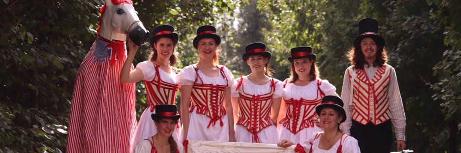 The Belles of London CiIty, with their Beast, Betley (a 2-legged horse) in some trees.